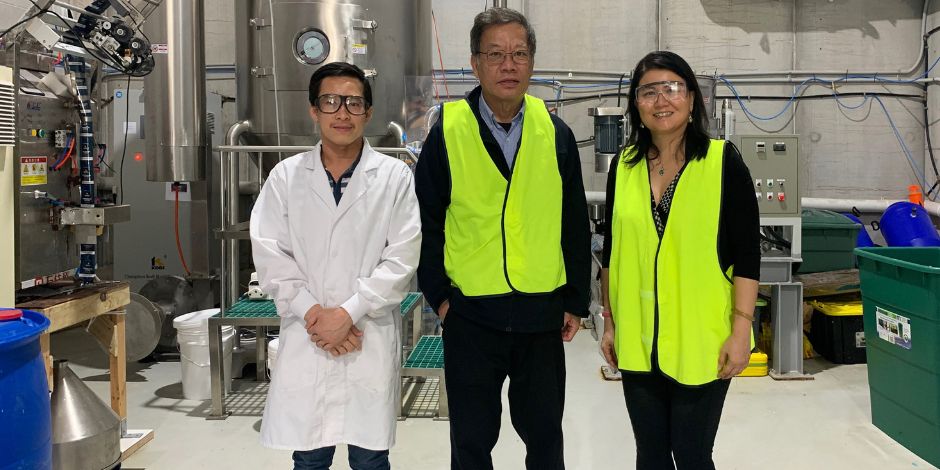 Van-Tri Luong (EcoMag), Dr Tam Tran (EcoMag’s Chief Technology Officer) and Professor Cordelia Selomulya (Future Food Systems - Research & Commercialisation Director) with EcoMag’s spray dryer, capable of producing 10kg per day of high-grade Mg organics in powder form